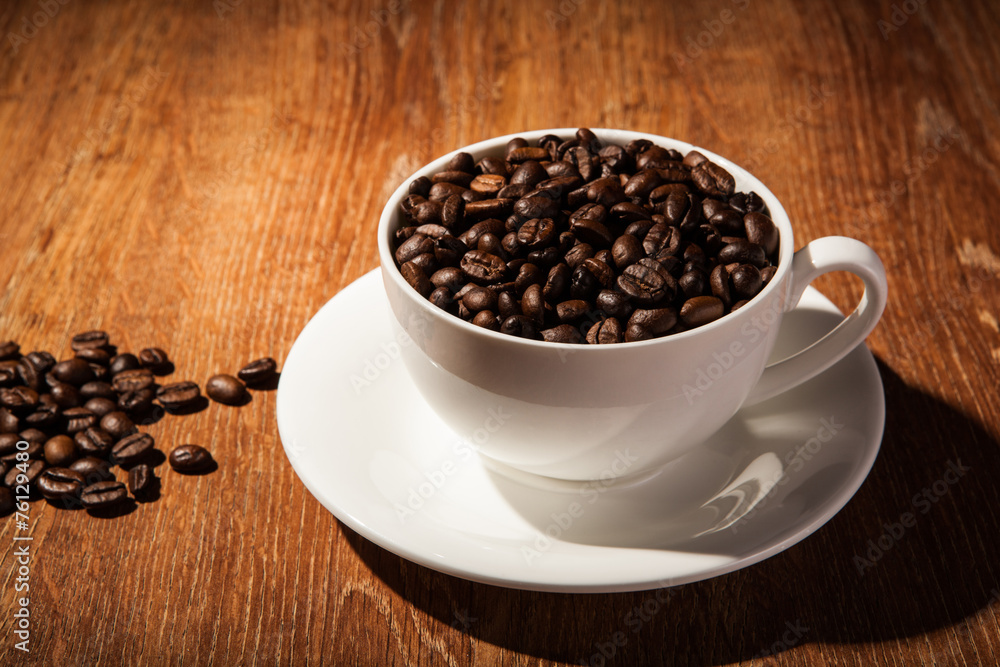 Still-life with a cup of coffee beans Still-life with a cup of coffee beans