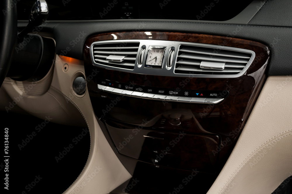 Panel of business car. Auto interior detail.