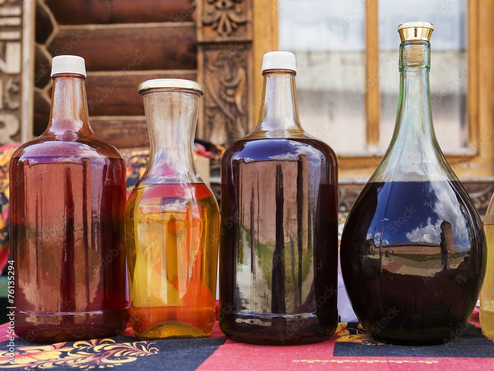 Russian alcoholic drink mead with reflection Kremlin in Suzdal,