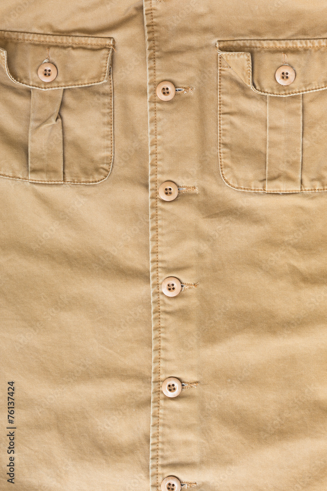 front pocket on brown shirt textile texture background