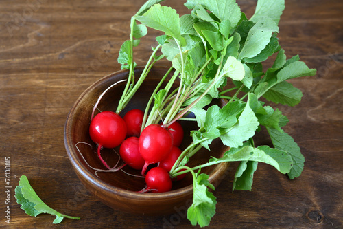 bunch of fresh radishes in a bowl
