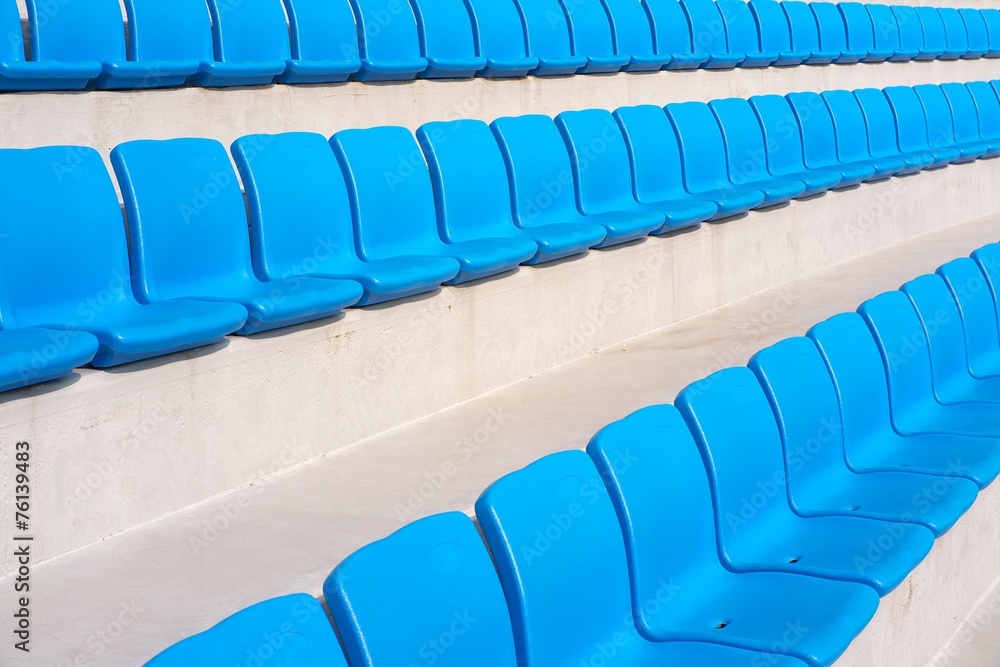 Fototapeta premium Rows of empty blue stadium seats