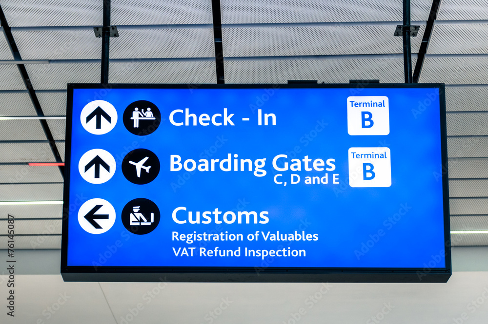 Info sign at international airport - Directions boarding gates