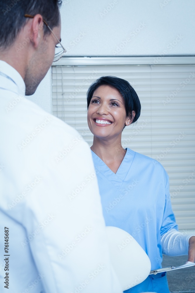 Fototapeta premium Dentists discussing reports