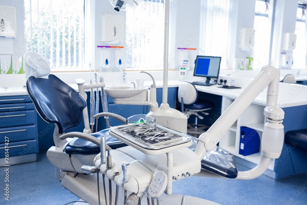 Inside of the clinic with dentists chairs, computer and tools Inside of the clinic with dentists chairs, computer and tools