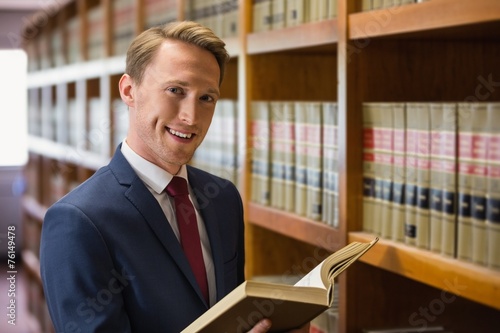 Handsome lawyer in the law library photo