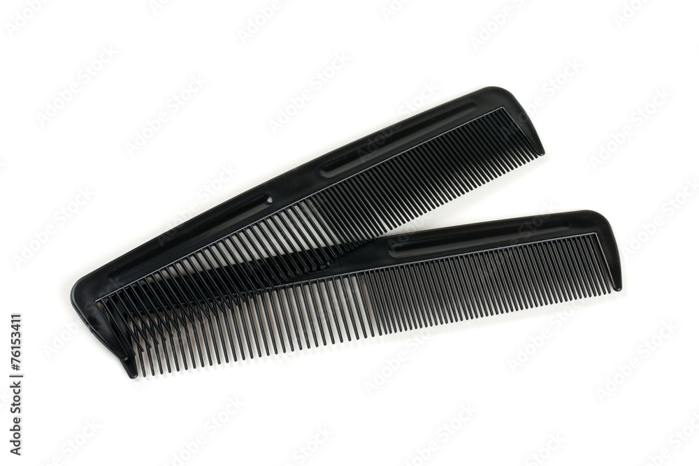 two black combs for hair isolated on white