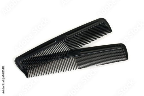 two black combs for hair isolated on white