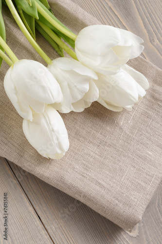 Fototapeta Naklejka Na Ścianę i Meble -  white tulips on rustic wood background