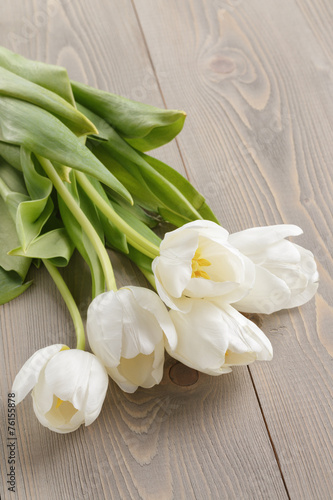 Fototapeta Naklejka Na Ścianę i Meble -  white tulips on rustic wood background