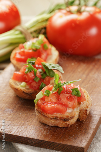 Italian bruschetta with tomatoes onion and basil