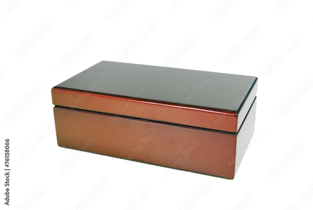 The varnished decorative casket isolated on a white background The varnished decorative casket isolated on a white background
