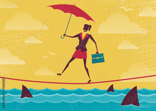 Businesswoman walks Tightrope with Umbrella.