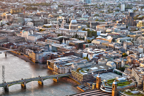 Aerial view over City of London at sunset #76167281