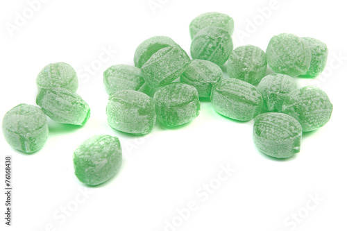 Green mints candy isolated on white background.