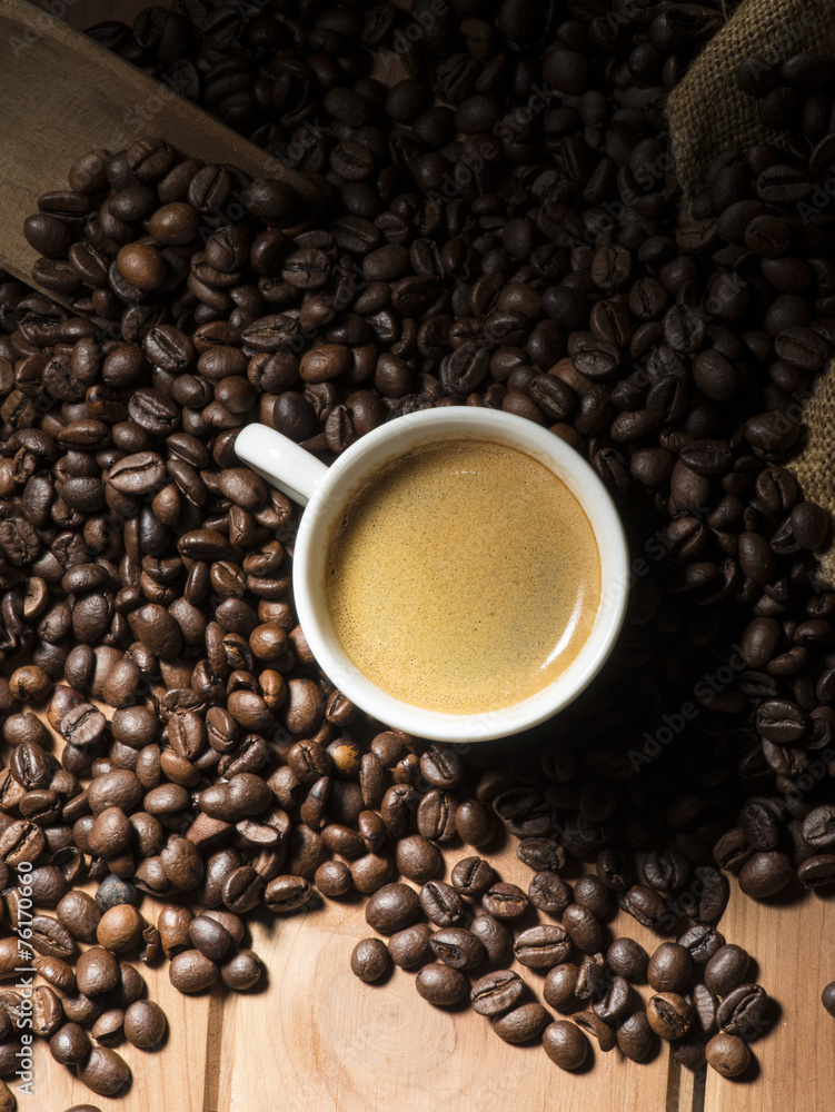 Fototapeta premium cup of coffee on the wooden table