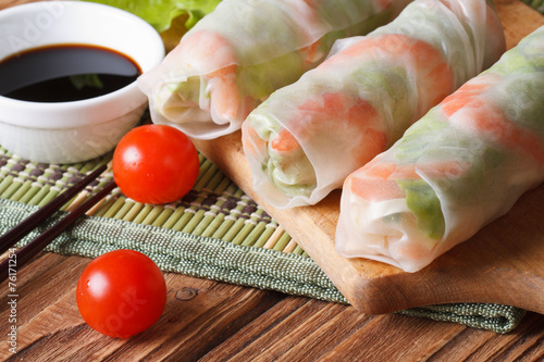Korean spring rolls with shrimp and sauce close up horizontal