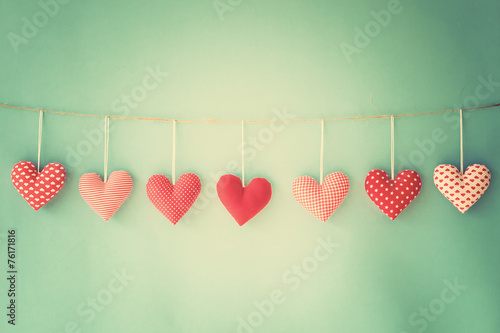 Vintage cotton hearts hanging on a line