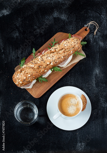 Sandwich (prosciutto, arugula), coffee and water