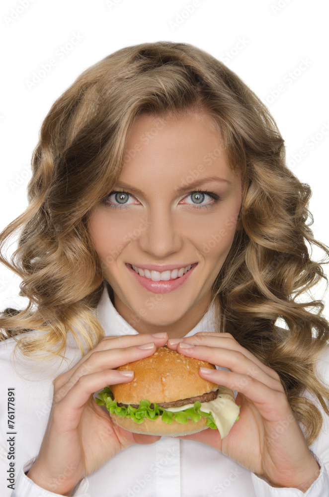 Beautiful young woman with hamburger