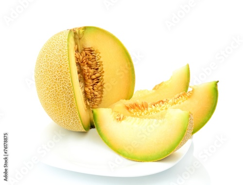 Melon galia with slices on plate isolated white in studio