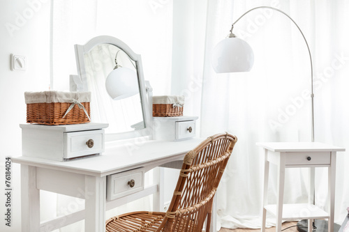 White dressing table with wicker elements Fototapeta