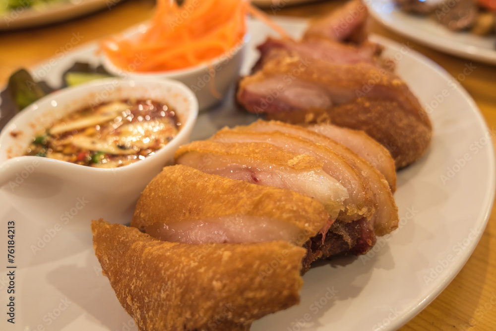 Grilled pork knuckle with spicy sauce Grilled pork knuckle with spicy sauce