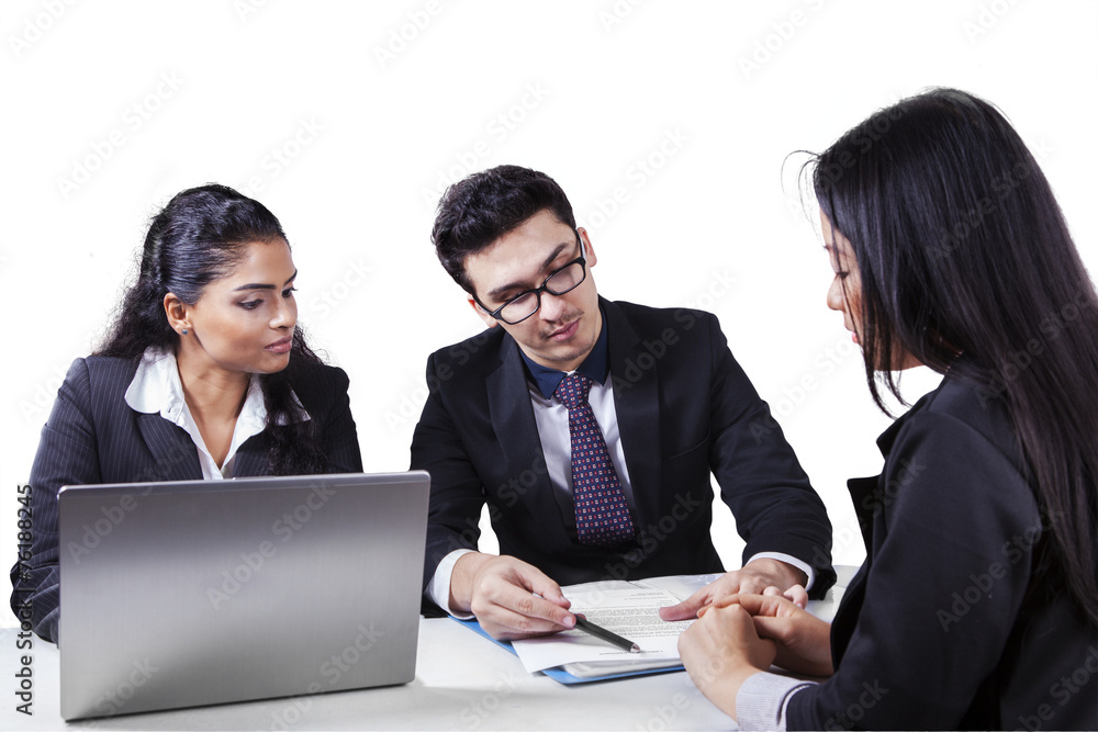 Businessman explaining a document Businessman explaining a document