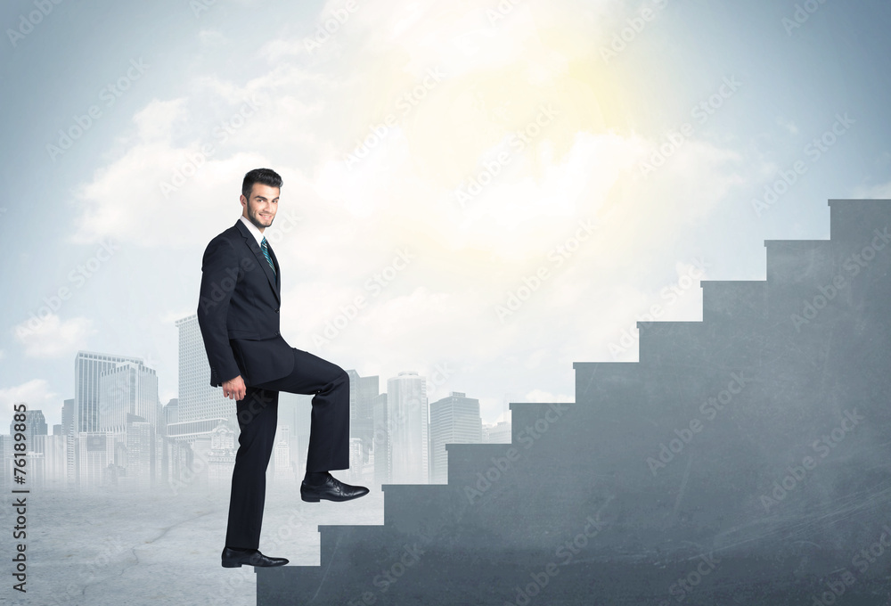 Businessman climbing up a concrete staircase concept Businessman climbing up a concrete staircase concept