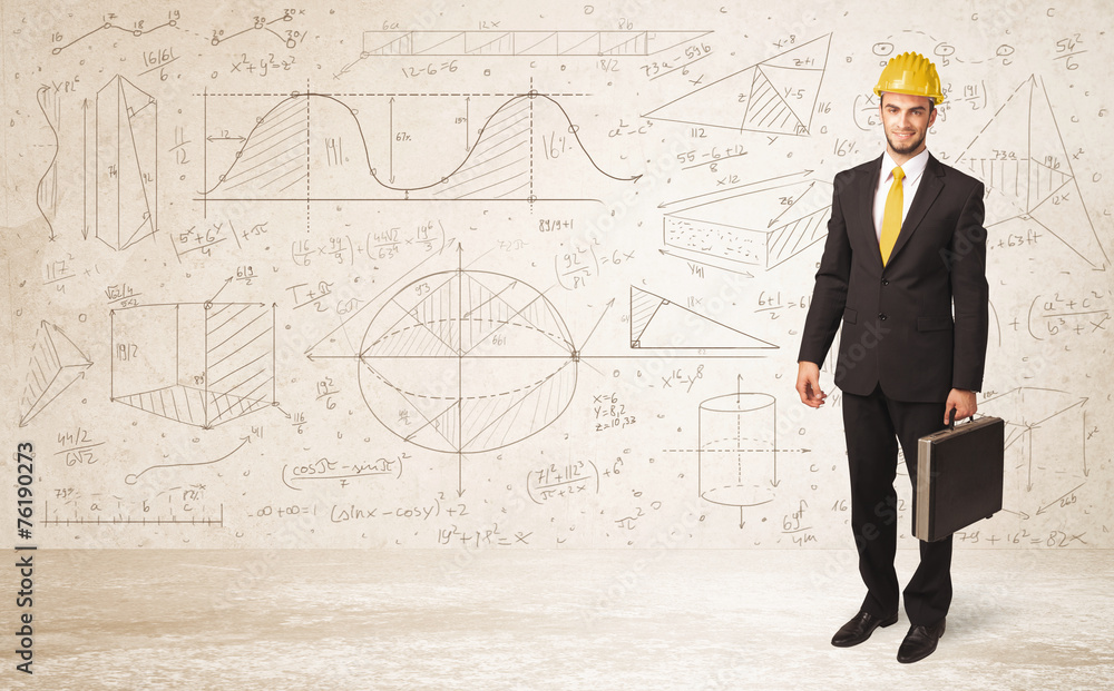Handsome engineer calculating with hand drawn background Handsome engineer calculating with hand drawn background