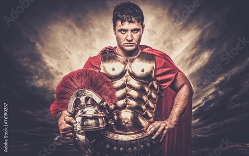 Obraz na plátně Legionary soldier against stormy sky