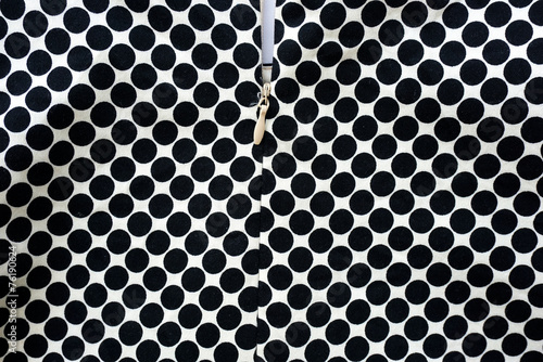 Black and white dots fabric with zipper background
