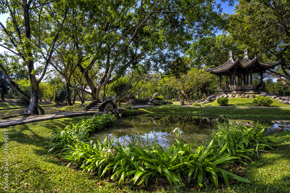 Chinese classical garden with pavilions and pond