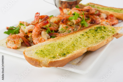 Bread with garlic herb butter and prawns
