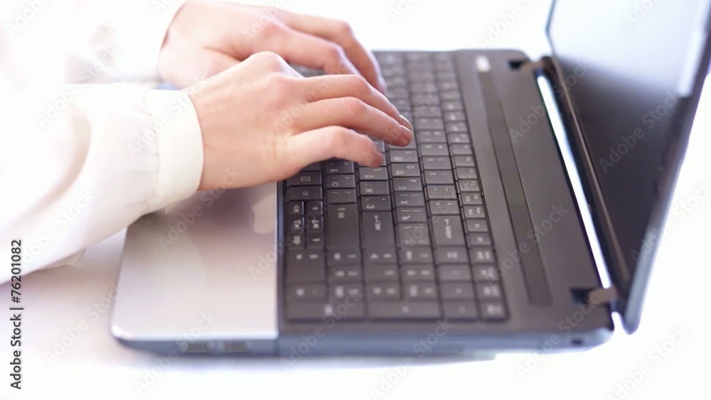 elegant hands typing on laptop computer keyboard elegant hands typing on laptop computer keyboard