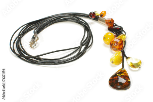 Modern amber necklace isolated on the white background
