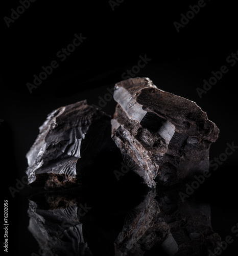 Coal lumps on dark background © Lukas Gojda