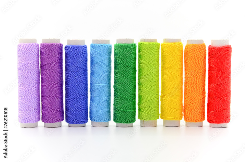 Set of colorful spools of thread Set of colorful spools of thread
