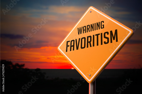 Photography Favoritism on Warning Road Sign.
