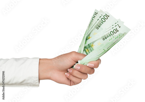 Female hand holding euro banknotes isolated on white