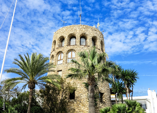 Alter Leuchtturm im Yachthafen  Puerto Banus, Marbella, Spanien photo