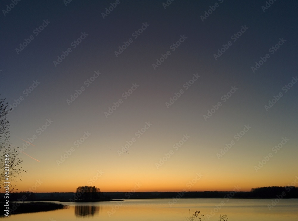 Quet landscape with Lake and sky at dawn