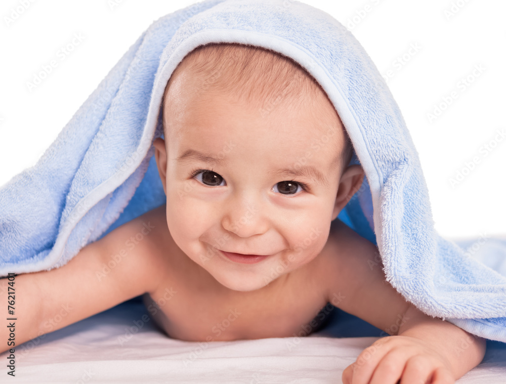 Funny smiling baby after bathing