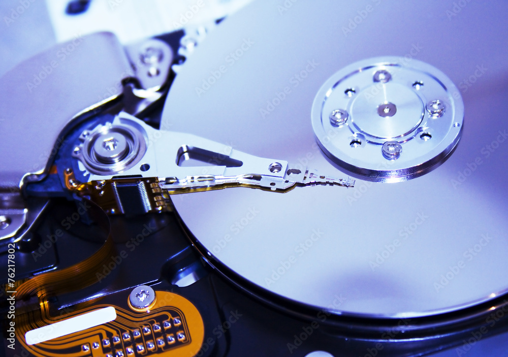 Close up of modern opened hard disk drive Close up of modern opened hard disk drive