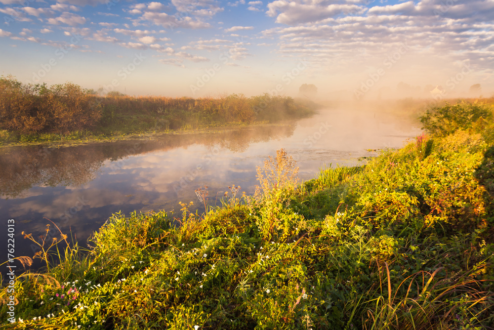 misty morning on the river and clouds reflected in water misty morning on the river and clouds reflected in water