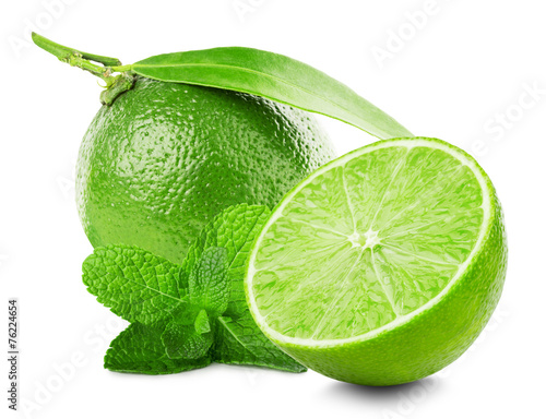Lime with slice and mint leaves isolated on white background