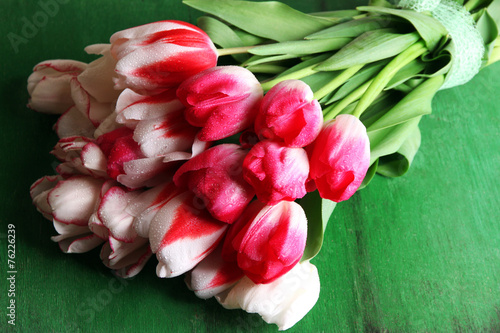 Fototapeta Naklejka Na Ścianę i Meble -  Beautiful tulips on color wooden background