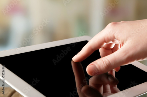 Hand using tablet PC