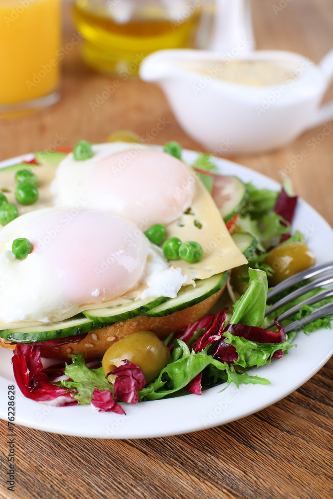 Sandwich with poached eggs, cheese and vegetables Sandwich with poached eggs, cheese and vegetables