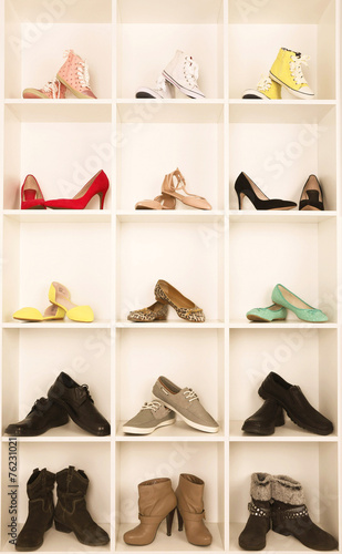 Collection of shoes on shelves